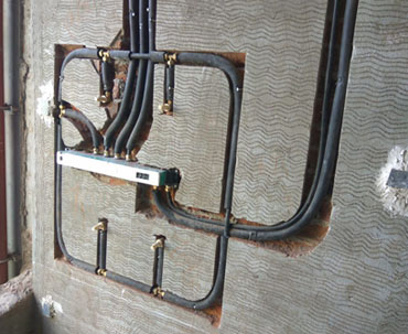 KiTEC composite pipes installed in a wall