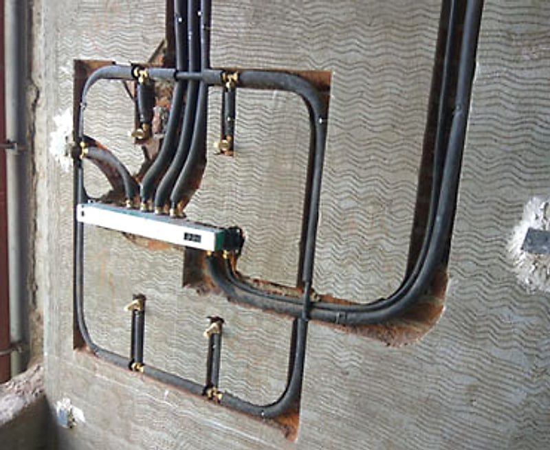 KiTEC composite piping installed in a wall